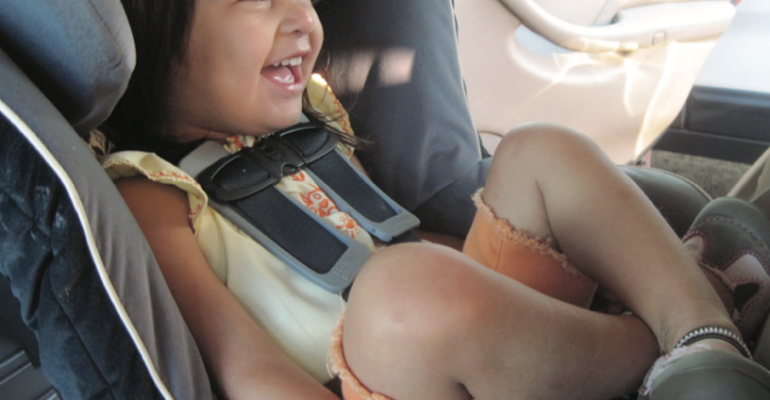 girl in car seat